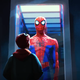 Miles looking at various incarnations of the Spider-Man suits Peter has in storage.